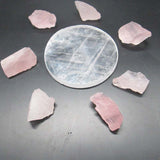 Clear Selenite Circular Charging Plate with Rose Quartz Pieces